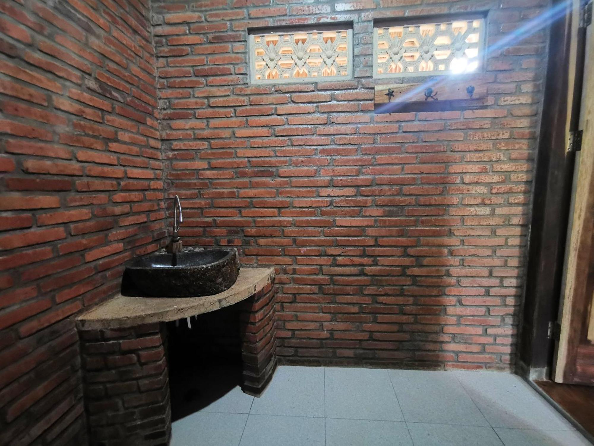 Coconut Tree Cottages Batukaras Rom bilde