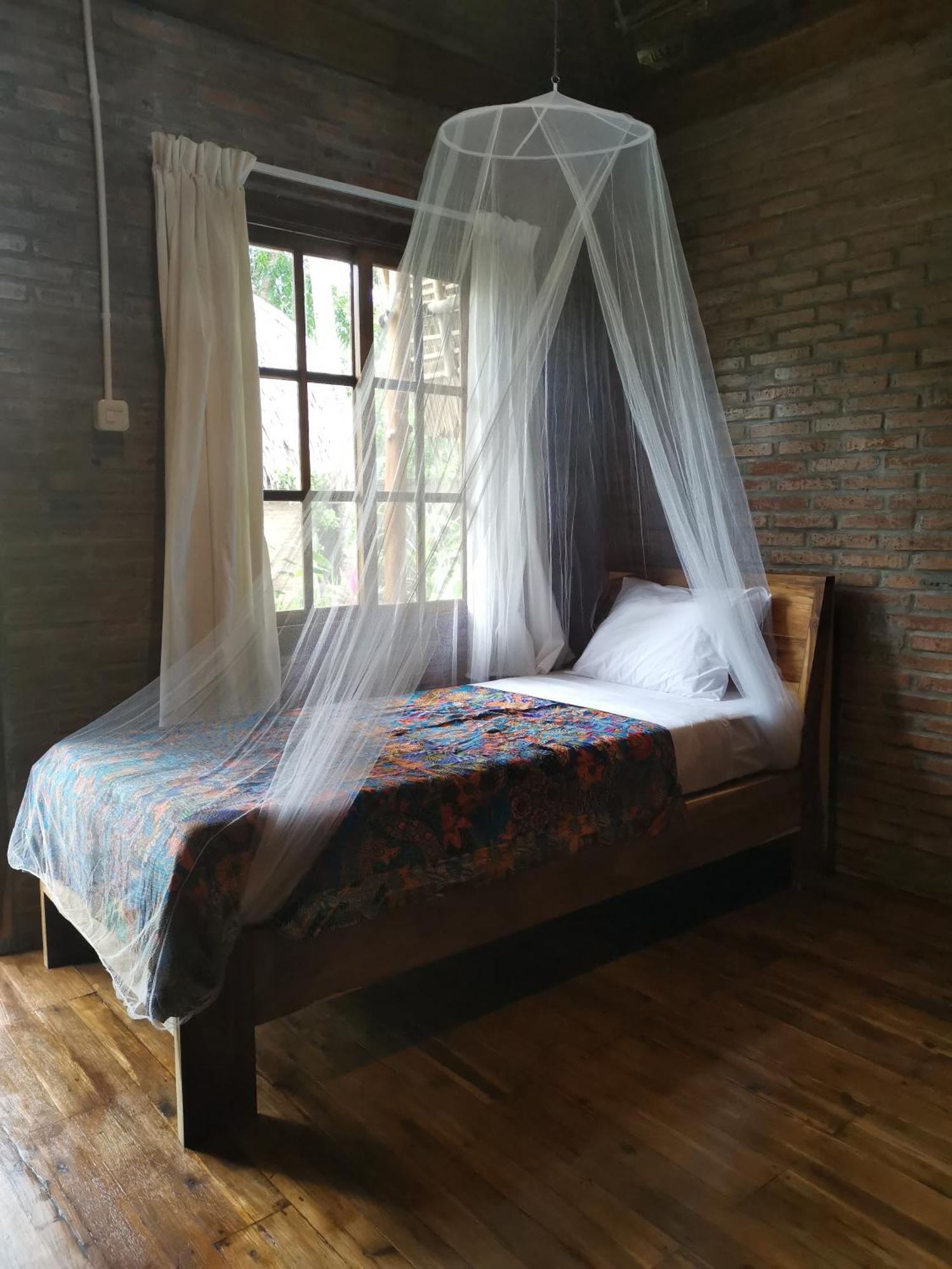 Coconut Tree Cottages Batukaras Rom bilde